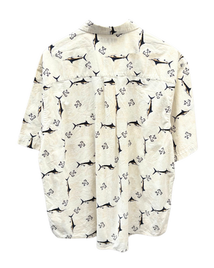 White shirt with black fish pattern on a white background