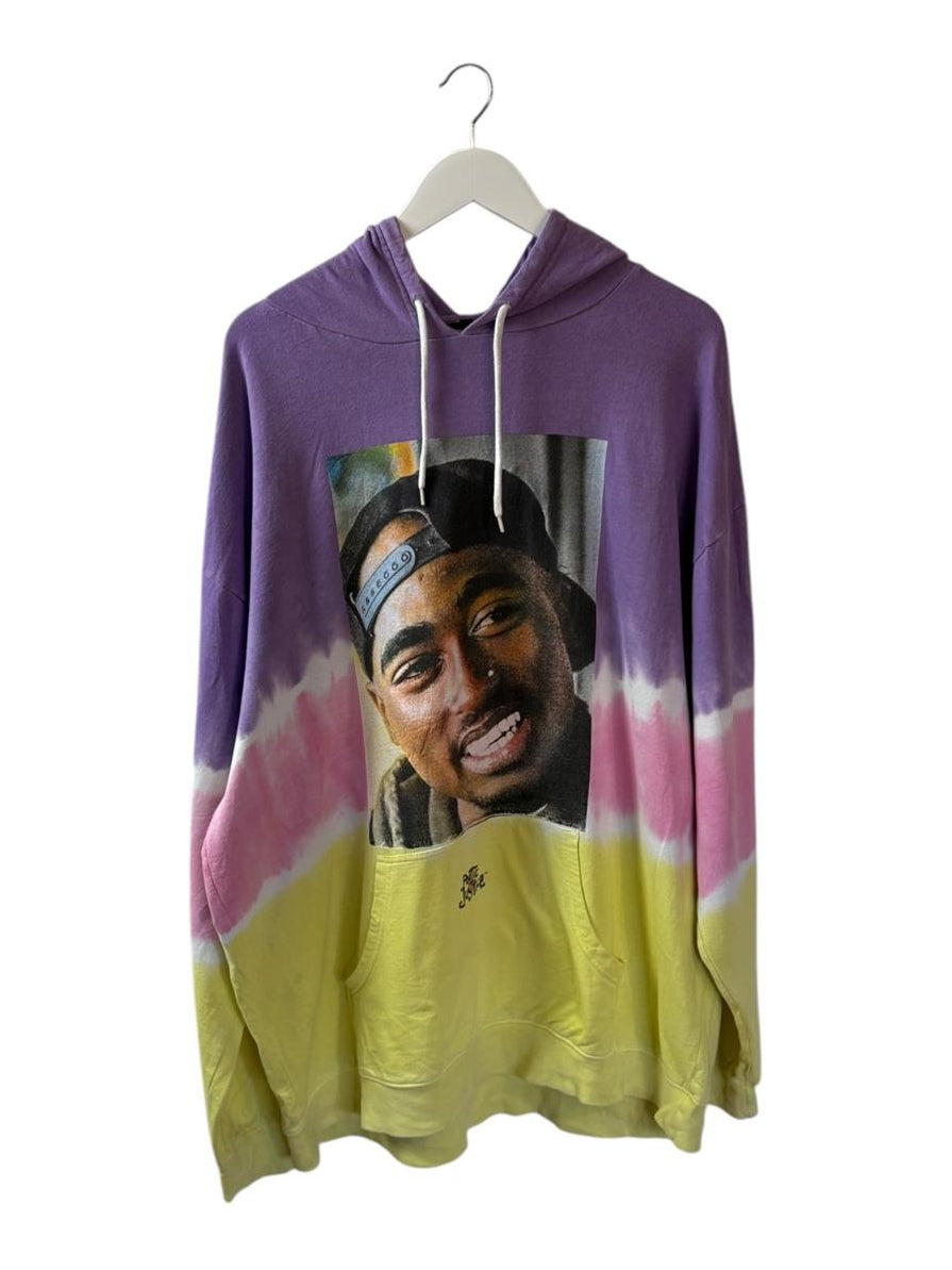 Tie-dye hoodie with a graphic of a smiling 2pac on a hanger against a white background