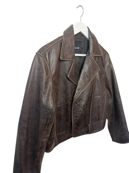 The side view of brown leather  biker jacket on a white hanger white background