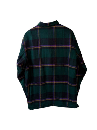 plaid green flannel shirt on white background 