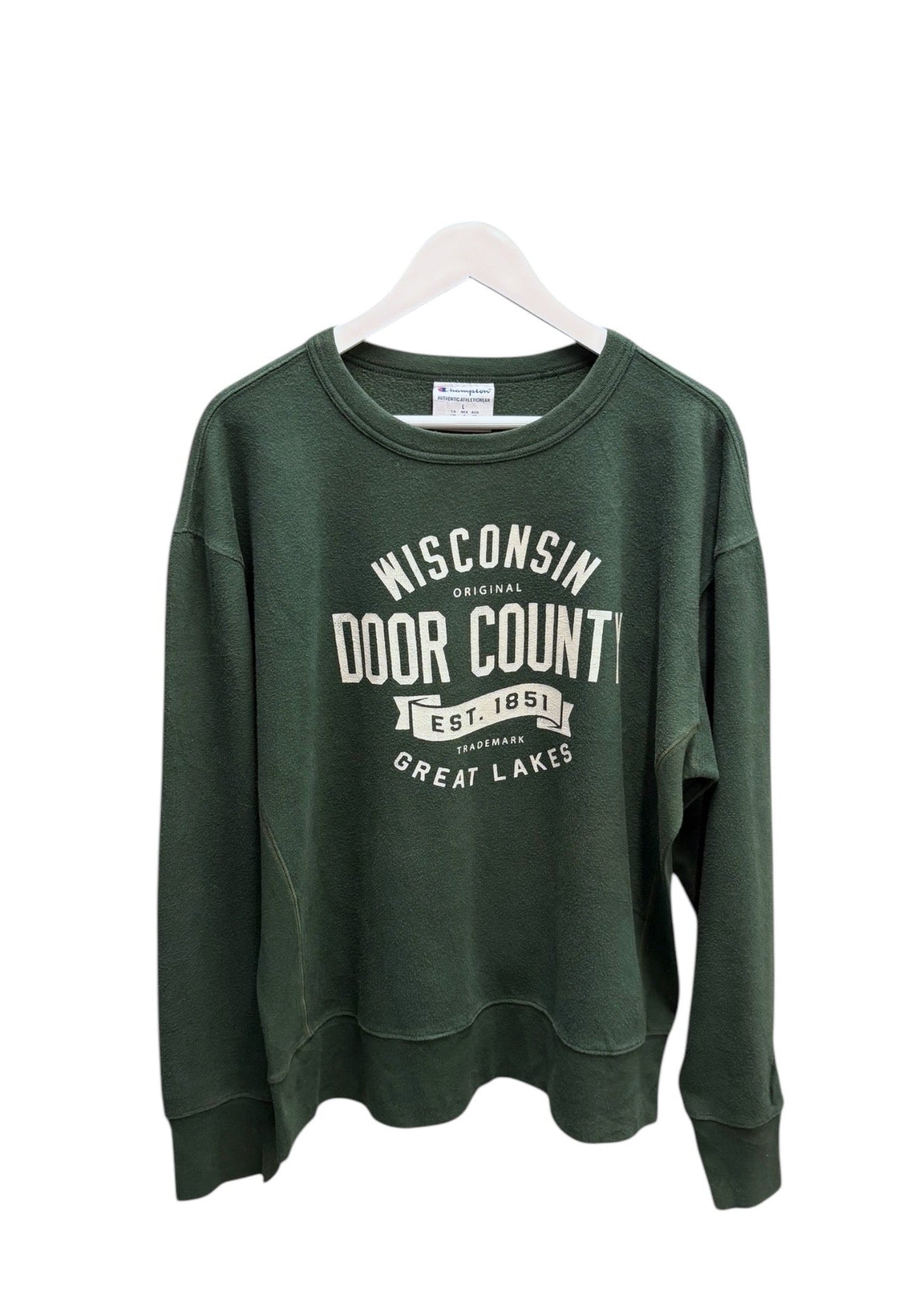 green wisconsin door county sweater with hand hanger