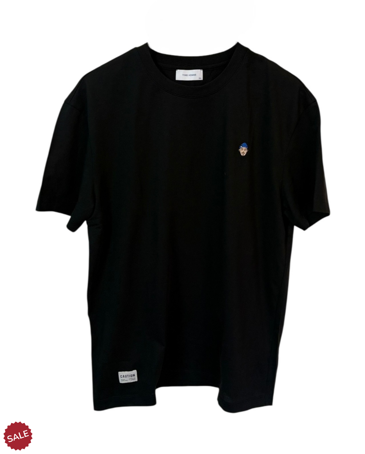 Black graphic tee featuring a cool face cartoon blend of minimalism and intrigue. Crafted from a soft cotton-nylon blend
