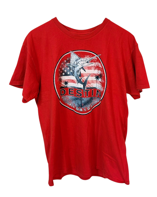 Vintage red t-shirt from Destin, Florida, emblazoned with a sun-drenched coastal graphic. Soft cotton.