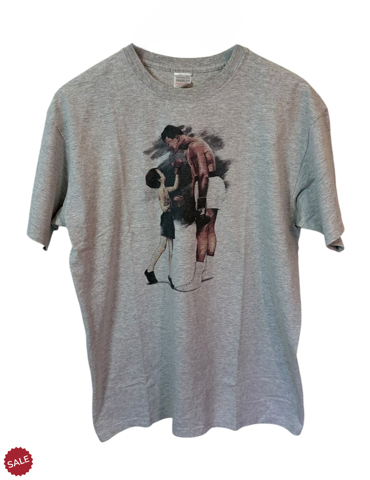 Grey Graphic Tee featuring the legendary Muhammad Ali. It can be worn with jeans or perfect for layering. 
