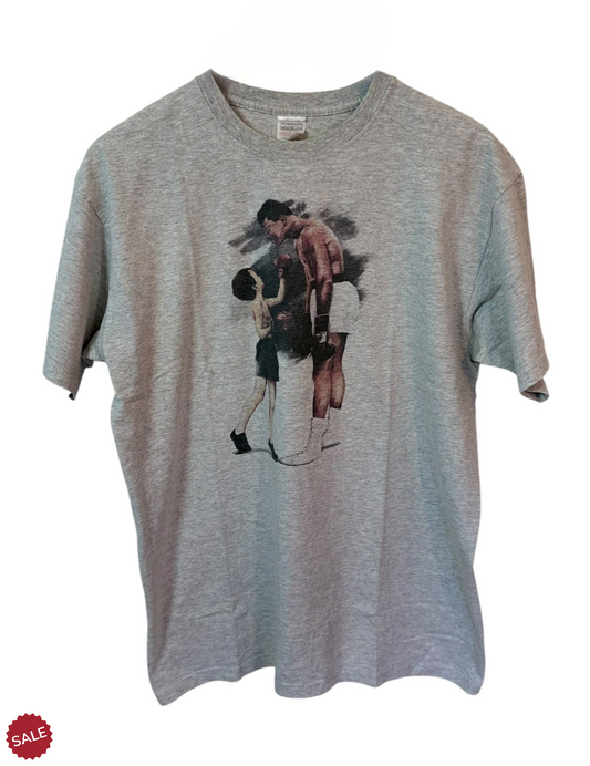 Grey Graphic Tee featuring the legendary Muhammad Ali. It can be worn with jeans or perfect for layering. 
