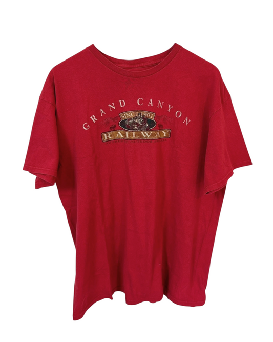 Red graphic t-shirt featuring a retro Grand Canyon Railway logo, capturing the spirit of travel and adventure.