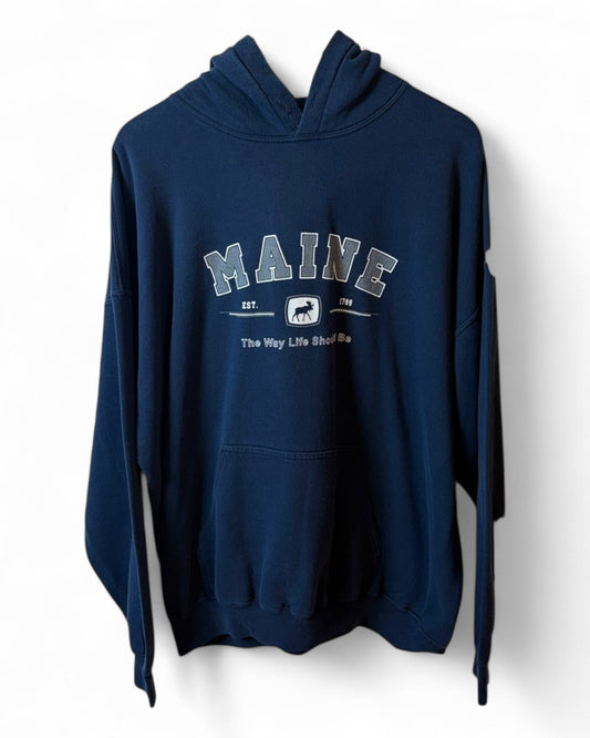 DESCRIPTION

Navy fleece Maine hoodie with varsity lettering and a small moose icon beneath. Drawstring hood, kangaroo p