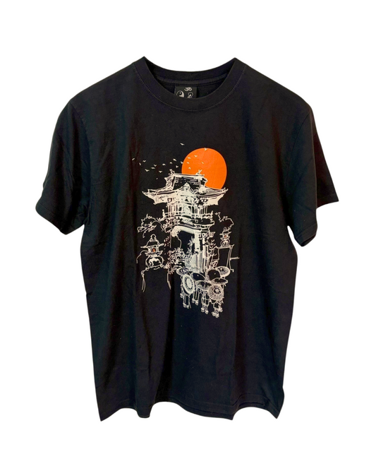 Black t-shirt featuring a striking Japanese temple print beneath a glowing orange sun. 