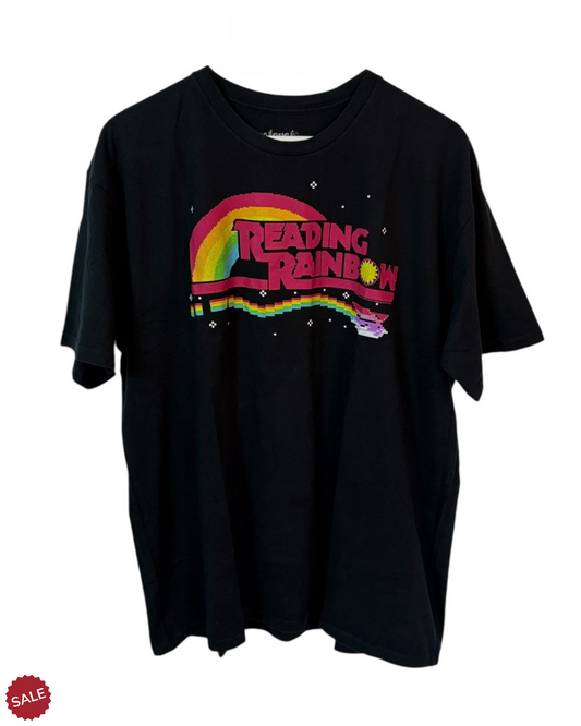 DESCRIPTION

Black t-shirt emblazoned with the iconic "Reading Rainbow" logo, a nostalgic nod to the beloved children's programme.